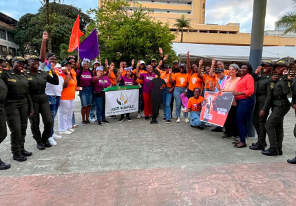 Mujeres de comunidades afro conmemorando el día de la no violencia contra las mujeres