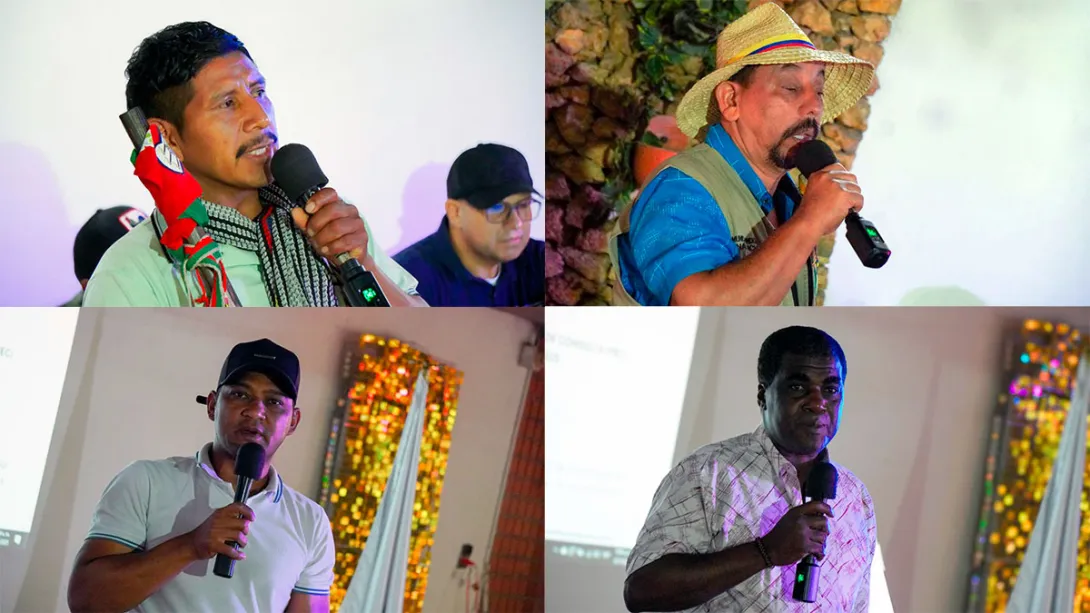 Hombres indígenas y afro hablando en la sesión del MEC